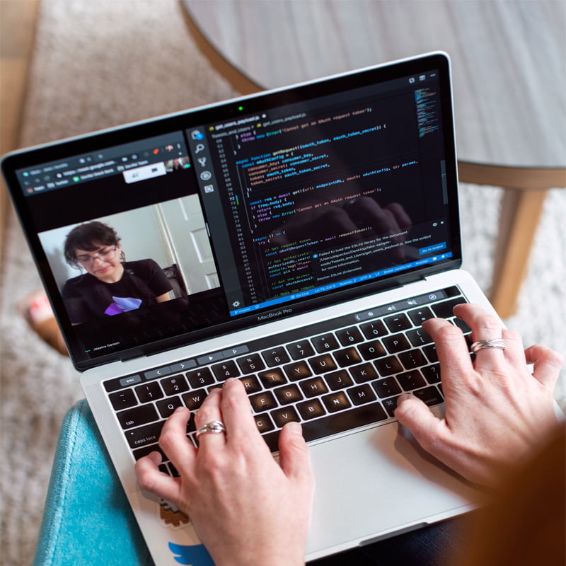 A computer screen showing a code editor with .NET code displayed.